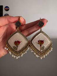 resin jhumka with red flower